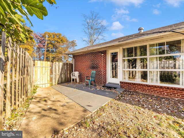 rear view of property with a patio area