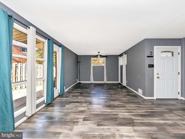 spare room with dark hardwood / wood-style flooring