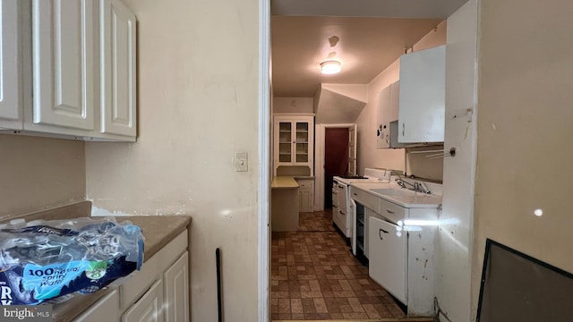 kitchen with sink and white cabinets