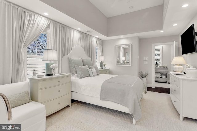 bedroom with light wood-type flooring and recessed lighting