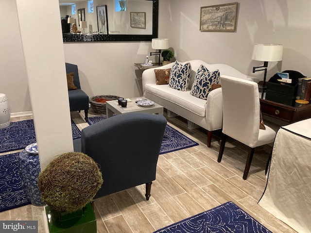 living area with wood finish floors