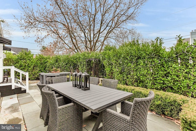 view of patio featuring outdoor dining space