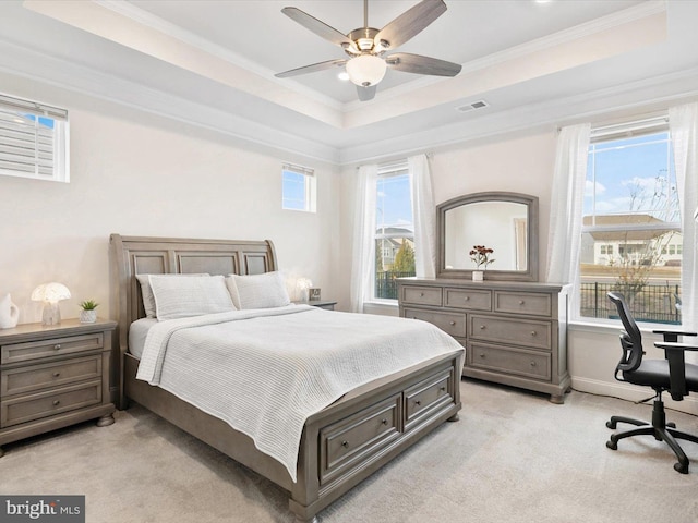 33423 Hickory St, Millsboro, DE 19966 - bedroom with light carpet, visible vents, crown molding, and a raised ceiling
