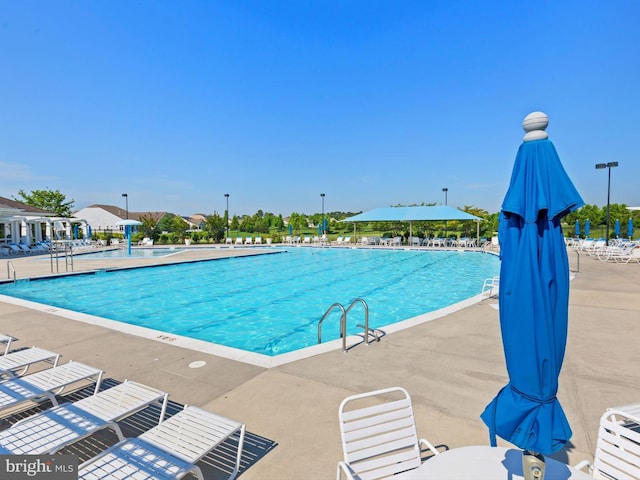 33423 Hickory St, Millsboro, DE 19966 - community pool with a patio