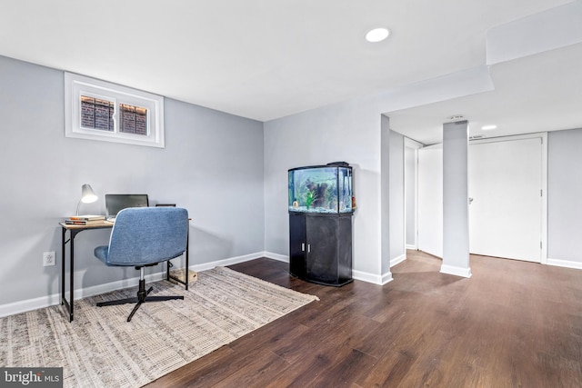 office with dark wood-type flooring, recessed lighting, and baseboards