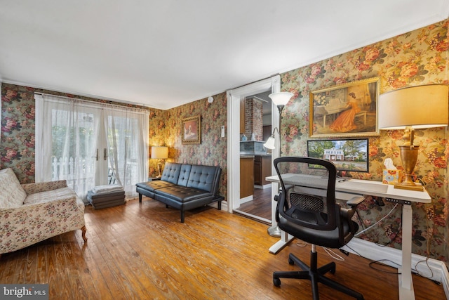 office area with hardwood / wood-style floors and french doors