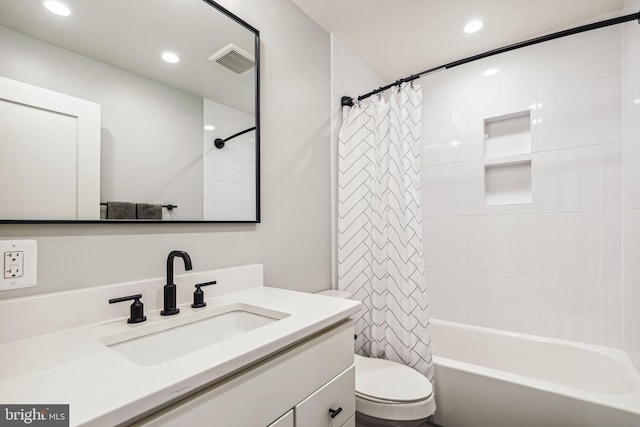 full bathroom with toilet, shower / bathtub combination with curtain, and vanity