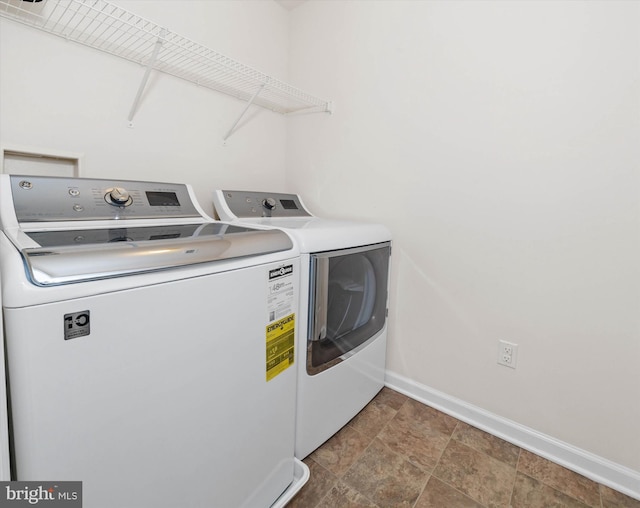 laundry area with washer and dryer