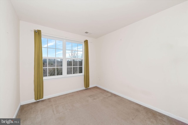 view of carpeted spare room