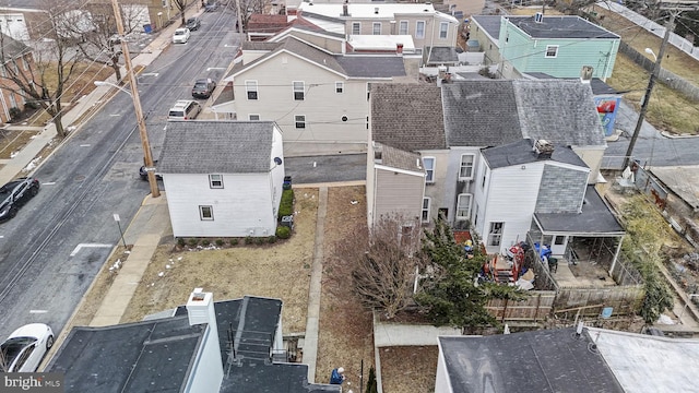 birds eye view of property with a residential view