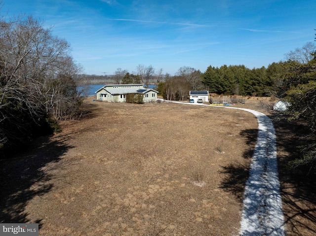 view of yard featuring a water view