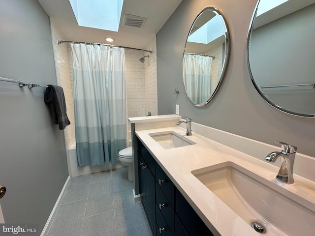 bathroom with a sink, visible vents, toilet, and shower / bath combination with curtain