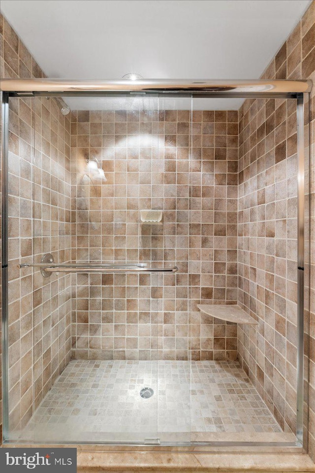 full bath featuring a stall shower