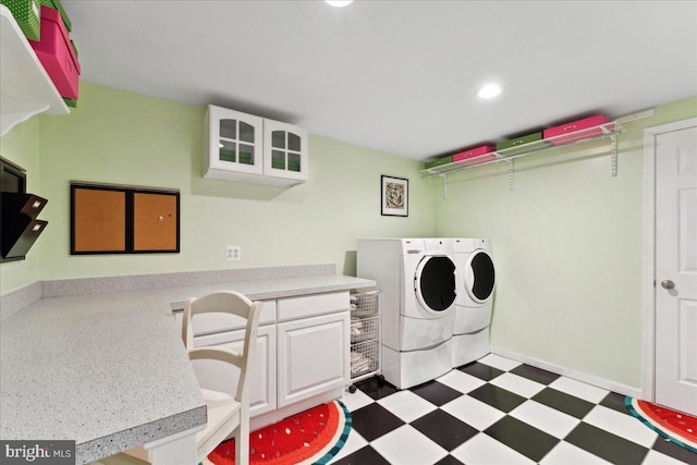 clothes washing area featuring tile patterned floors, laundry area, washing machine and dryer, and recessed lighting