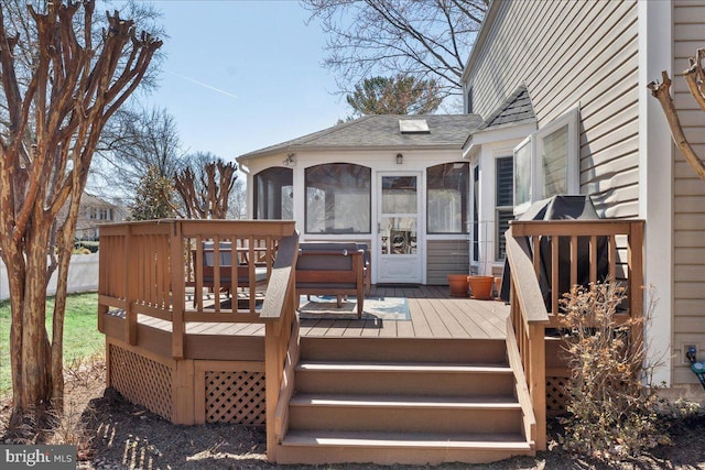 wooden terrace with a sunroom