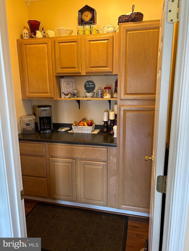 kitchen featuring dark hardwood / wood-style flooring