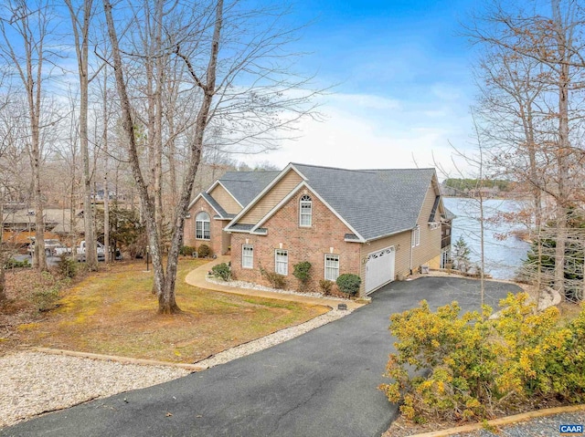 view of front of home featuring a water view and a front yard