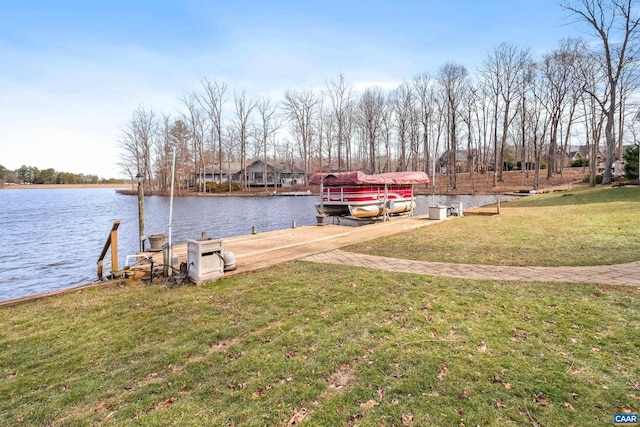 view of dock featuring a yard and a water view