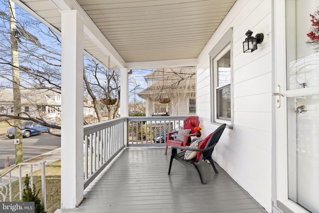 wooden deck featuring a porch