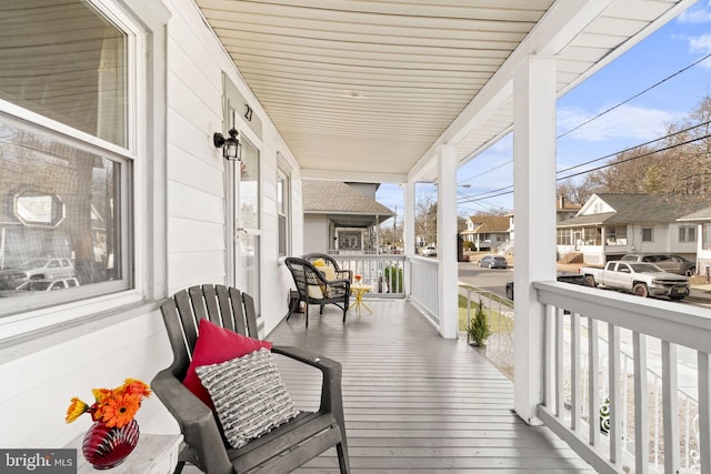 sunroom with a residential view