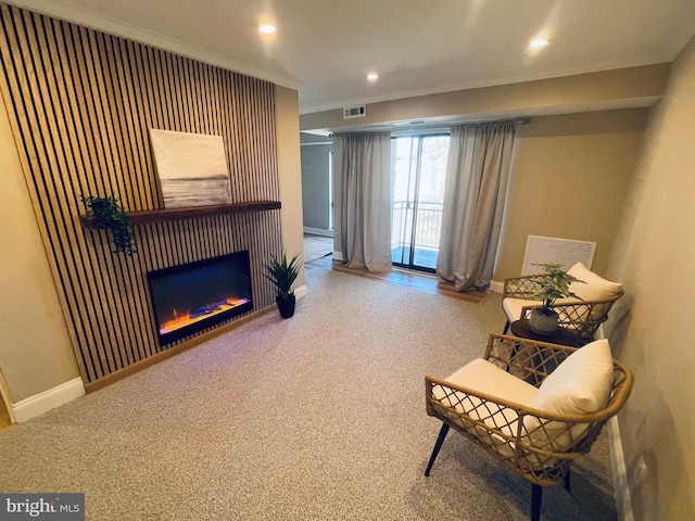 sitting room with baseboards, carpet, visible vents, and recessed lighting