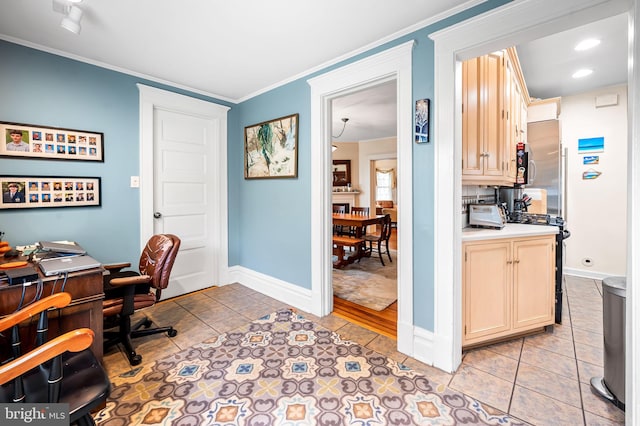 office space featuring ornamental molding, baseboards, and light tile patterned floors