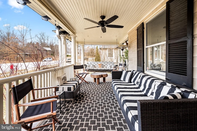 view of patio with outdoor lounge area and ceiling fan