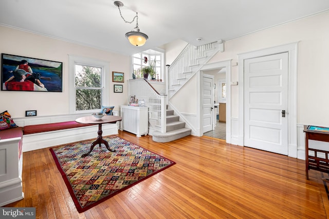 interior space featuring wood-type flooring and stairway