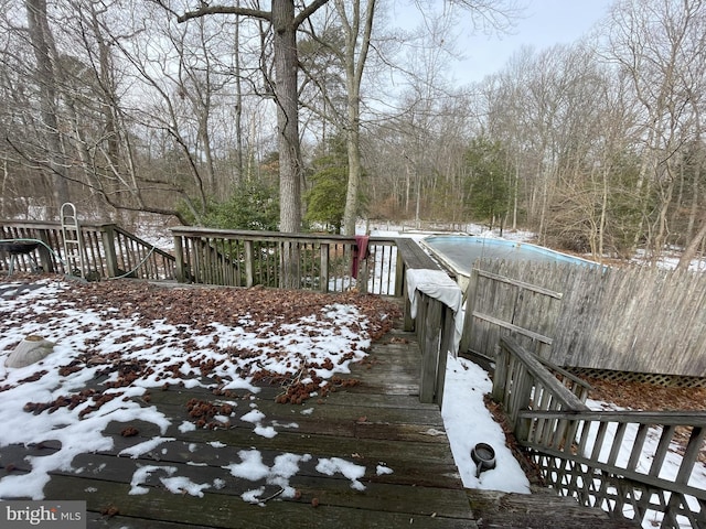 view of snow covered deck