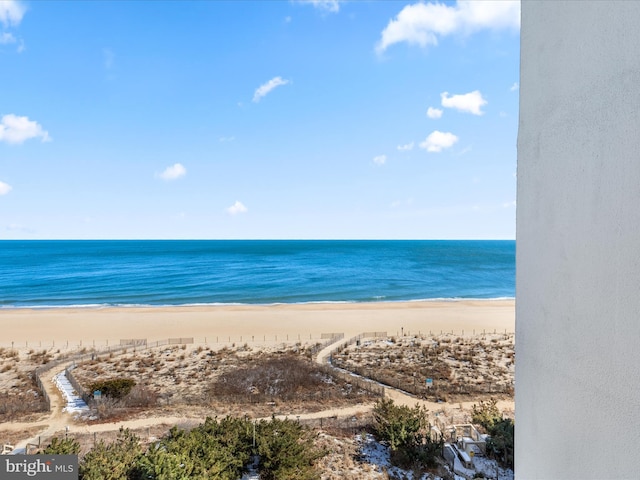 view of water feature with a beach view