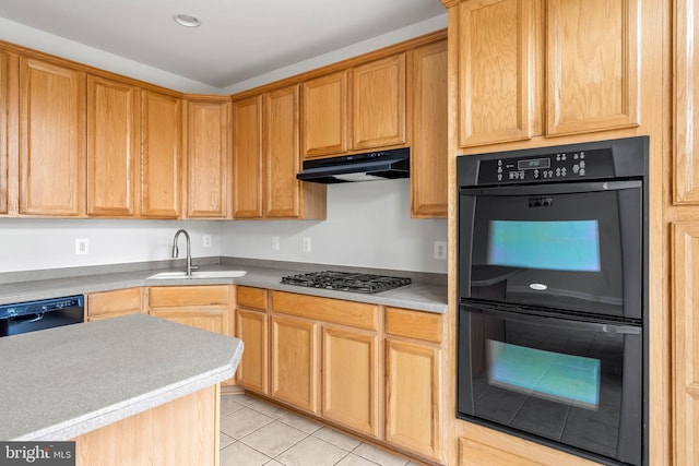 kitchen featuring light tile patterned floors, under cabinet range hood, a sink, light countertops, and black appliances