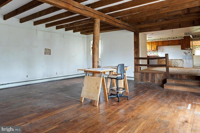 interior space with a baseboard heating unit, wood-type flooring, and beam ceiling