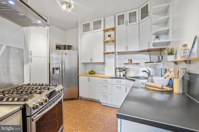 kitchen with stainless steel appliances, white cabinets, glass insert cabinets, and open shelves