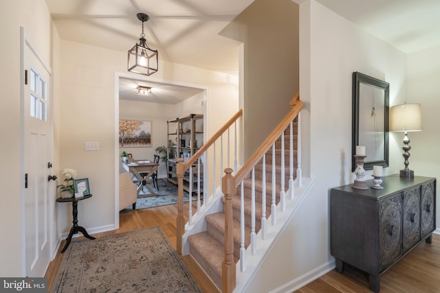 foyer entrance with light hardwood / wood-style flooring