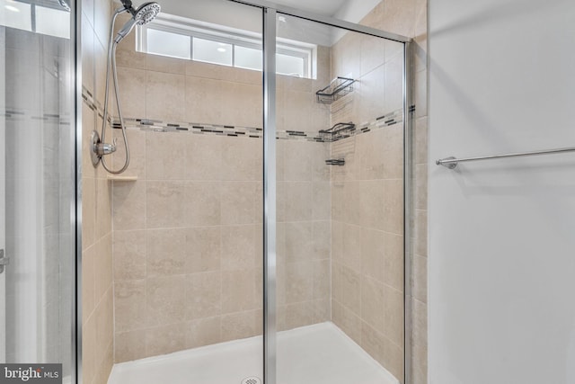 bathroom with a stall shower