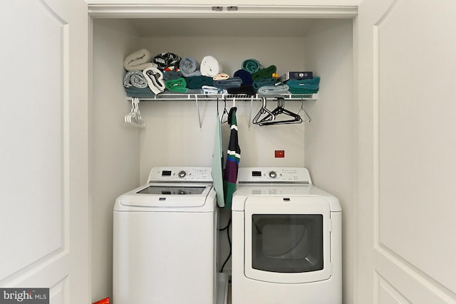 laundry area featuring laundry area and washing machine and clothes dryer