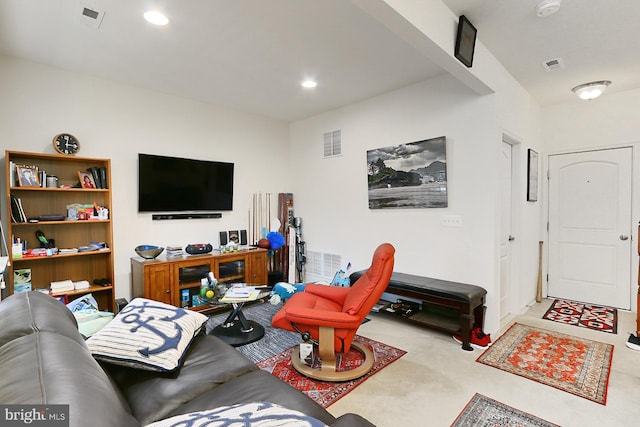 carpeted living room featuring recessed lighting and visible vents