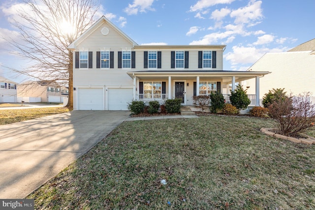 view of front of home featuring covered porch, a front yard, and a garage