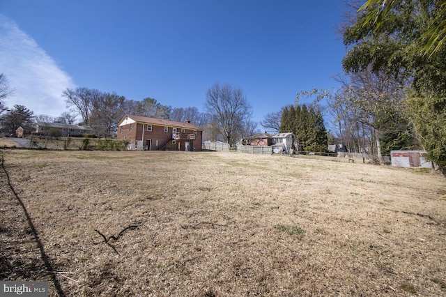 view of yard featuring fence