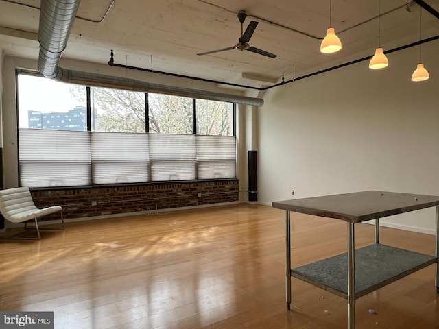 interior space featuring ceiling fan