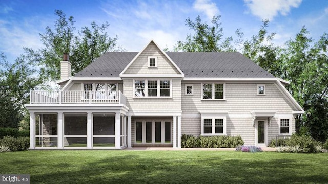 rear view of property with a chimney, a sunroom, a yard, and a balcony