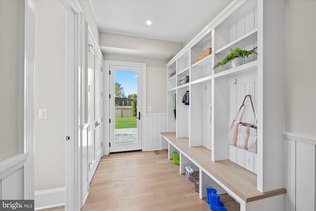 5408 Moorland Ln, Bethesda, MD 20814 - mudroom featuring a wainscoted wall, light wood finished floors, a decorative wall, and recessed lighting