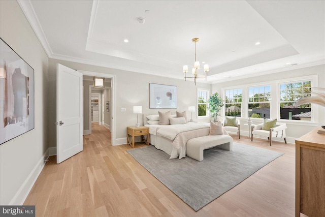 5408 Moorland Ln, Bethesda, MD 20814 - bedroom featuring a tray ceiling, light wood-style floors, a chandelier, recessed lighting, and ornamental molding