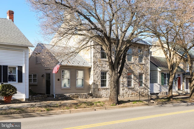 view of front of home featuring stone siding