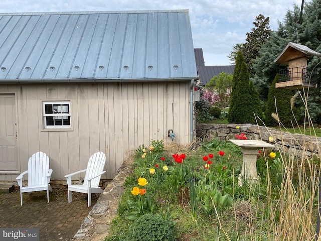 exterior space with metal roof and a standing seam roof