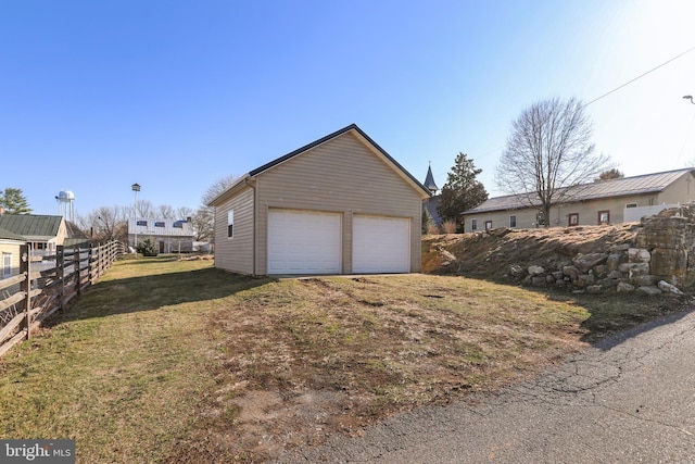 detached garage with fence