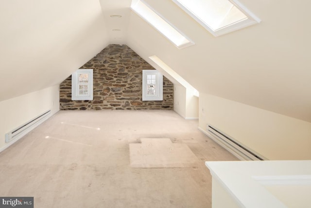 bonus room featuring lofted ceiling, carpet floors, a baseboard radiator, and a baseboard heating unit