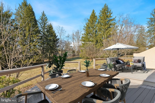 wooden terrace featuring an outdoor living space and outdoor dining space