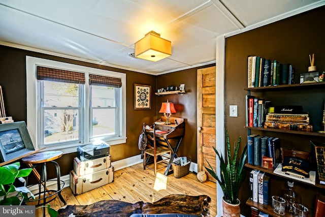 office with baseboards and wood finished floors