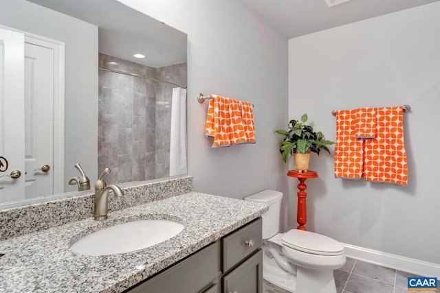 bathroom with a shower with shower curtain, vanity, toilet, and tile patterned floors